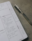 A closeup shot of part of a page in the friendship journal with handwriting on it