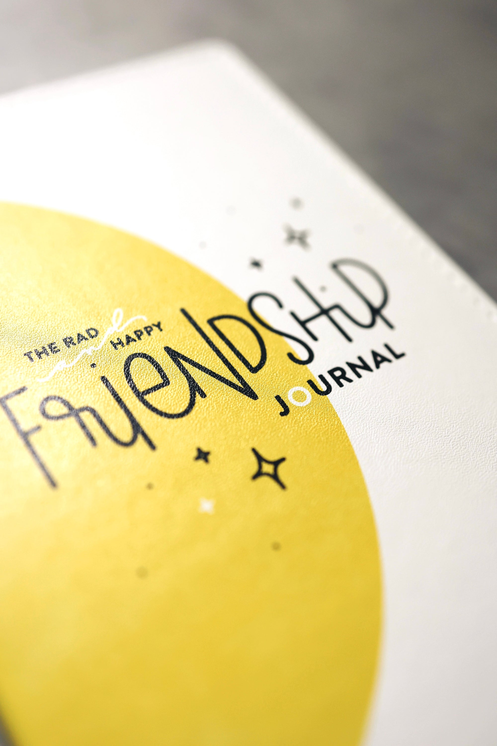 A close up shot of the cover of the friendship journal showing the title
