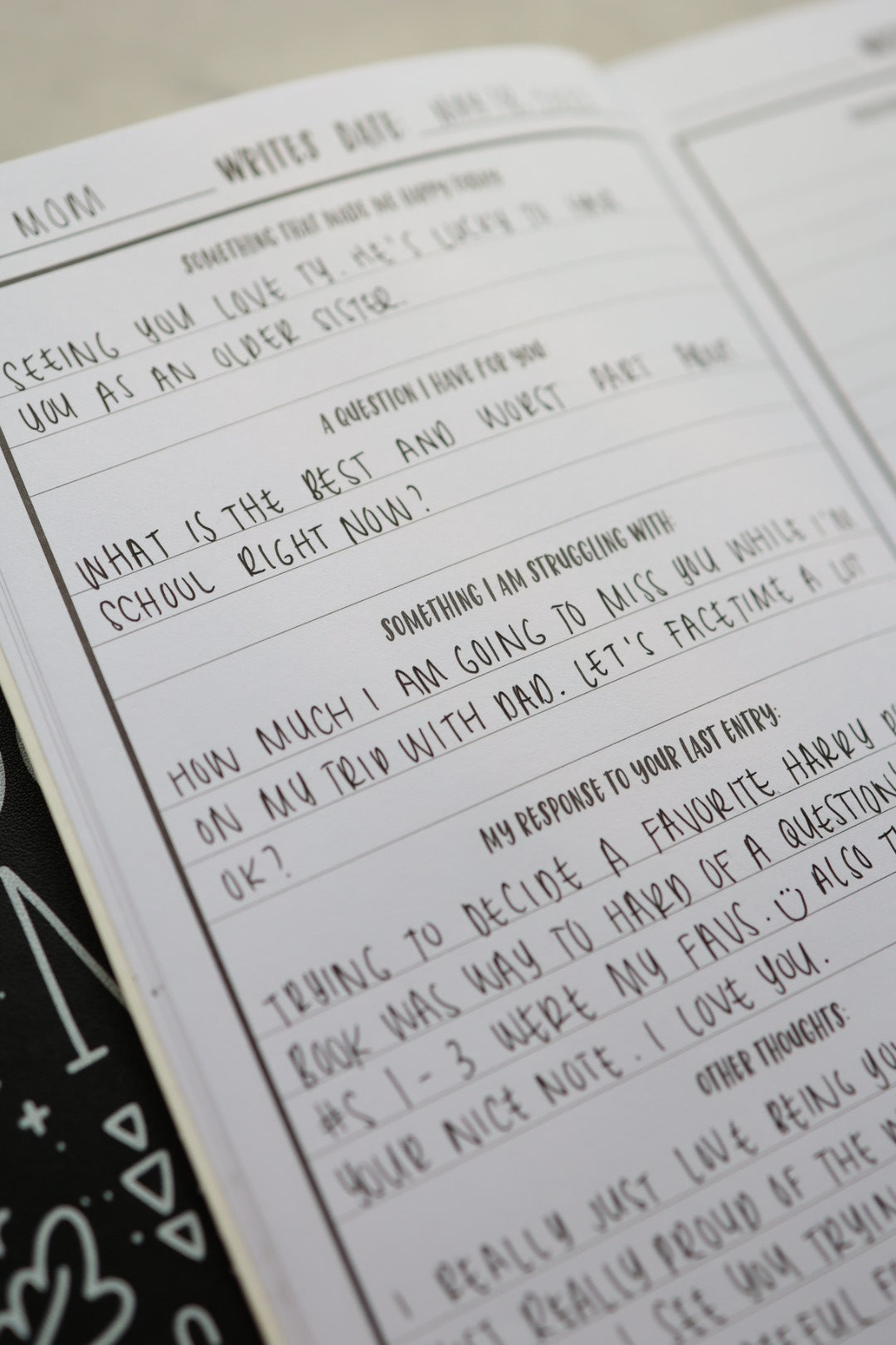 Artistic close up shot of prompts page with handwriting