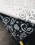 Artistic shot of close up of journals stacked