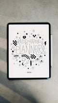 Digital planner cover with decorative text and symbols on a gray surface
