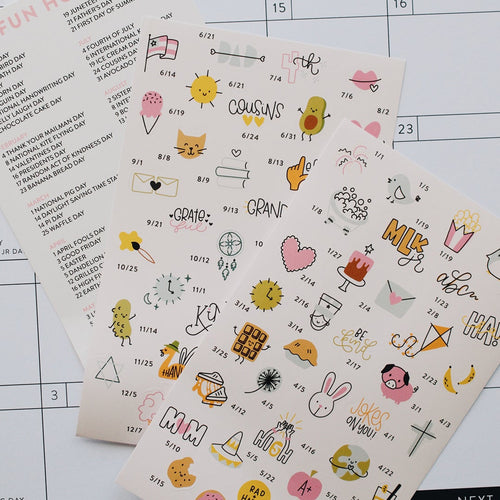Two sheets of decorative stickers with various designs on a grid background