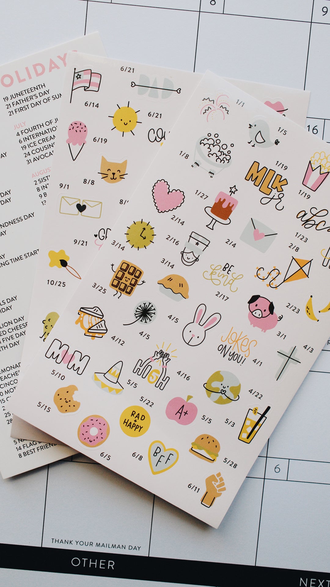 Sheet of decorative stickers with various designs on a grid background