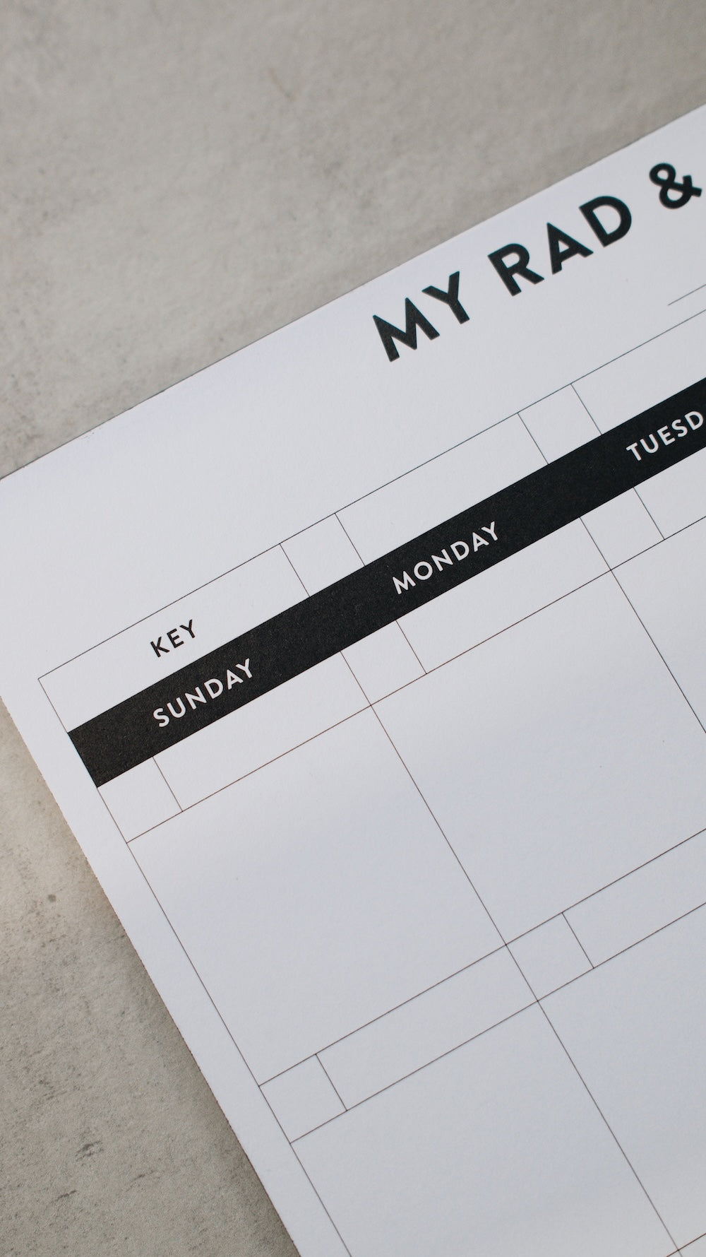 Monthly notepad with 'My Rad &' text on a plain background